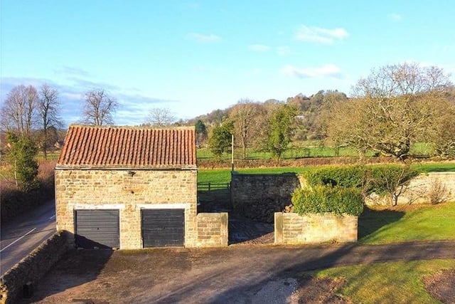 An image that shows how the stone barn fits in with the countryside setting.
