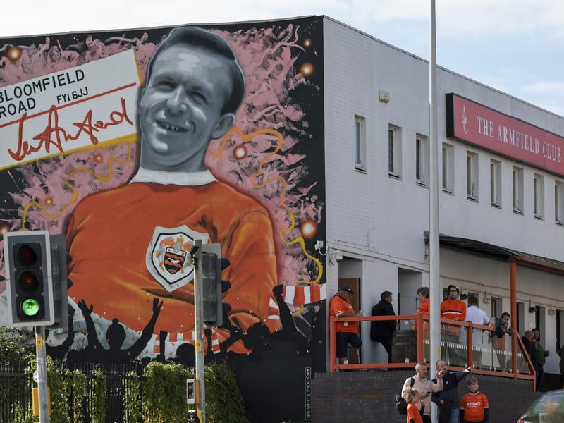 Supporters enjoy a pre-match drink at the well-known independent supporters club across the road from the stadium.