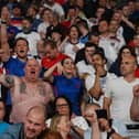 England supporters celebrate after winning the UEFA EURO 2020 semi-final football match between England and Denmark at Wembley Stadium in London on July 7, 2021. (Photo by Paul ELLIS / POOL / AFP) (Photo by PAUL ELLIS/POOL/AFP via Getty Images)