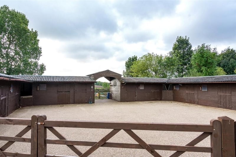 This house is so big that it even comes with it's own equestrian facilities. This is the paddock which include a ‘U’ shaped range of nine stables, two tack rooms and two storage areas