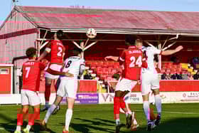 Harry Davis far right gets in a header but goes wide of the mark (photo: Dave Plumb)