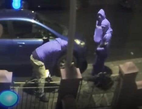 Police say four people in a small hatchback vehicle, all wearing dark hoodies and balaclavas, have been seen trying to steal catalytic converters.