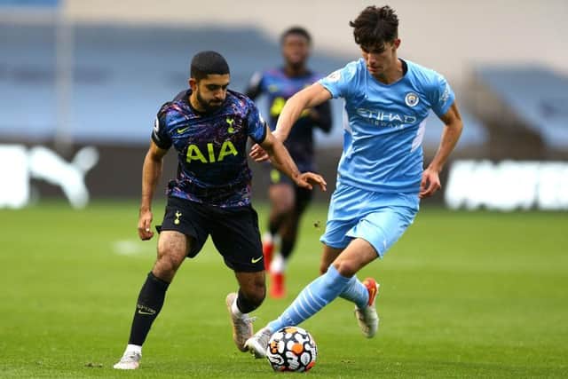 Finley Burns of Manchester City in action against Tottenham Hotspur during a Premier League 2 match in 2021. (Photo by Ashley Allen/Getty Images)