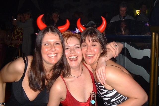 Devil's horns headwear for these girls at Heaven and Hell