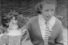 Jean pictured with the cup while wearing her Arnold House uniform