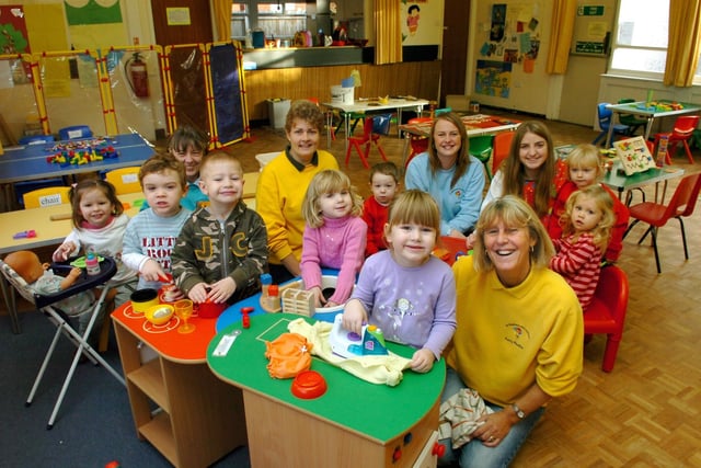 St Stephen's Pre-School supervisor Pauline Duncan (right) with some of the children and staff in the role-play area, 2006