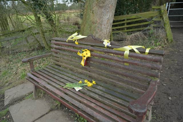 Flowers, and ribbons are tied to a bench by the River Wyre in St Michael's on Wyre (Credit: Dave Nelson/ PA)
