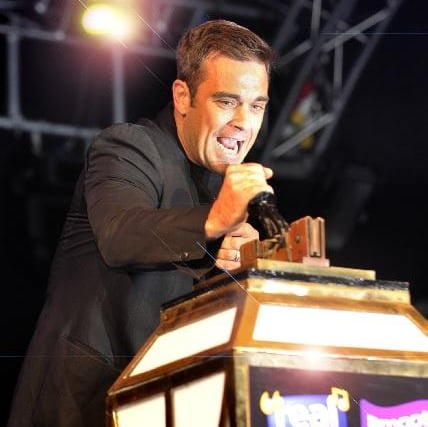 Pop star Robbie Williams switches on The Illuminations in 2010