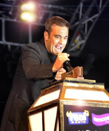 Pop star Robbie Williams switches on The Illuminations in 2010