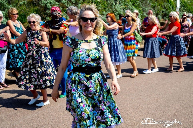 The ladies wore colourful, waisted jive dresses for the dance