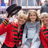 Young carer Sophia Hall with circus performers Lynne Mulley and Andrea O'Brien at the Blackpool Tower event.