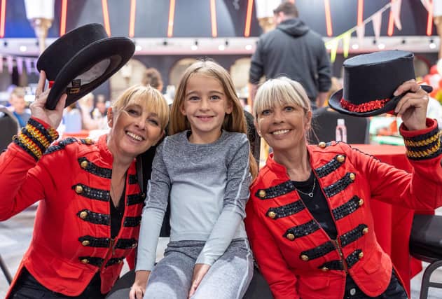 Young carer Sophia Hall with circus performers Lynne Mulley and Andrea O'Brien at the Blackpool Tower event.