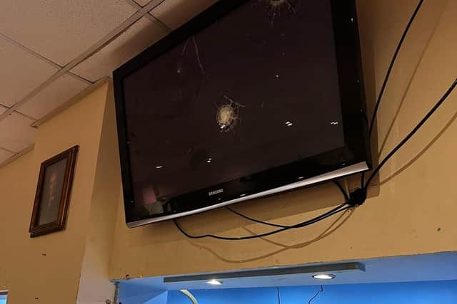Damage to the building included a smashed TV