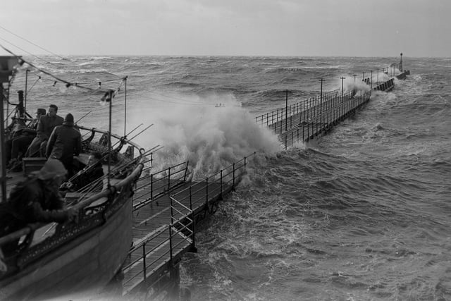 North Pier Jetty - During stormy weather in 1956 the anglers were still fishing from the end of the pier but the jetty was clearly out of bounds