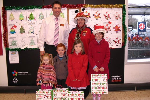Christmas competition winners at the Sainsbury store in Garstang. PIctured (Back from left): Mr Steve Spencer (store manager), Elaine Handy (store trainer). Front: Thea, Matthew, Louise, and Charlotte