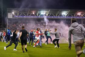 Supporters invaded the pitch at the City Ground after Tuesday night's play-off semi-final