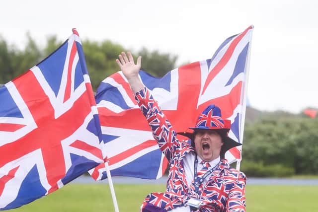 Year 3 teacher Dickson Barnaby took part in the school parade around the local streets in his Union Flag suit