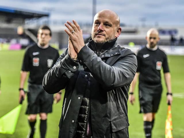 Adam Murray applauds the fans after the victory at AFC Telford United Picture: STEVE MCLELLAN