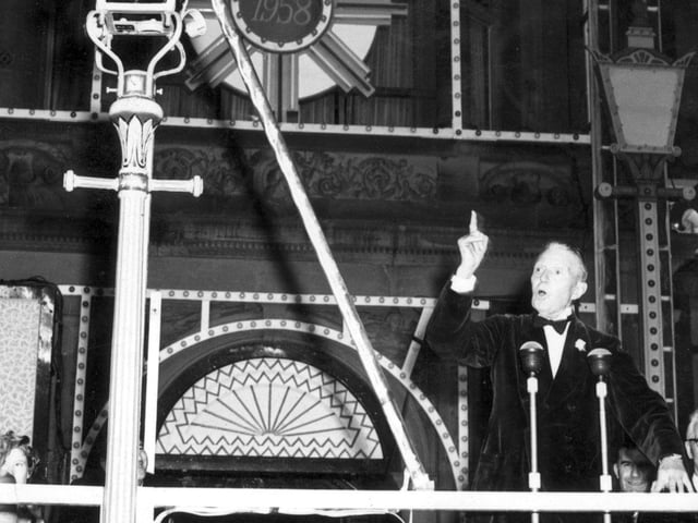 Lights switch-on 1958 - veteran actor A.E. "Matty" Matthews with his trademark gas lamp