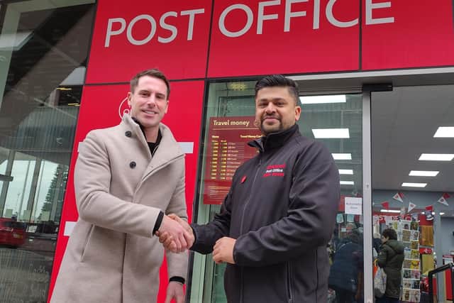 Blackpool South MP Scott Benton meets postmaster Azim Shaikh at the Blackpool Central post office.