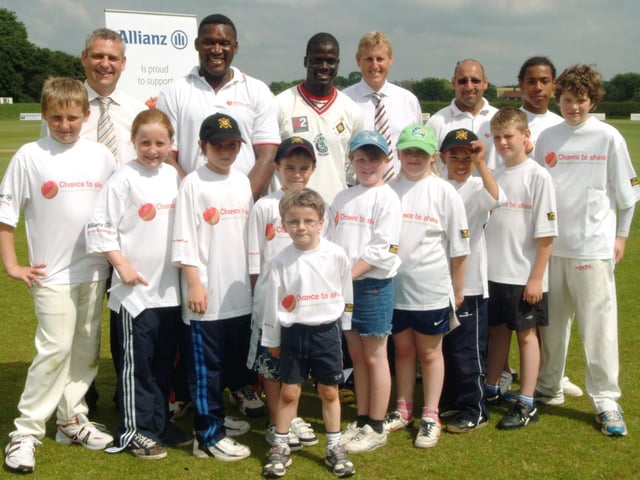 Former England cricket star Devon Malcolm, right, is pictured at The John Fretwell Centre during a coaching session with youngsters.