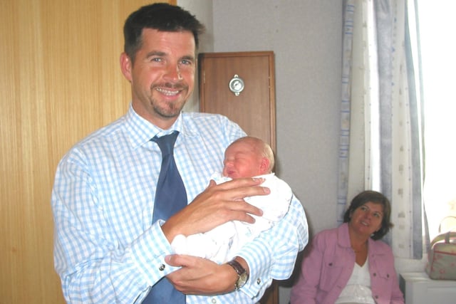 New Dad Dr Peter Smith with baby Will. He was supporting a call for longer paternity leave