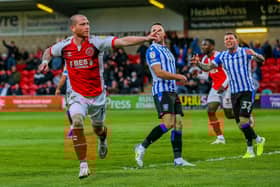 Fleetwood Town forward Joe Garner scores against Sheffield Wednesday.