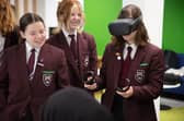 Pupils from Montgomery Academy with the VR headset.