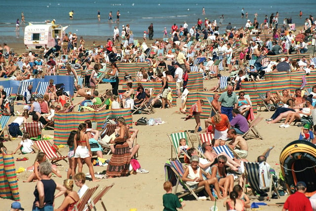 Those long, hazy days on the beach. A packed scene in the 1990s