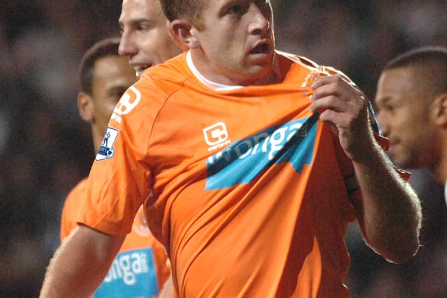 Charlie Adam shows his allegiance after scoring the opening goal between Blackpool FC and West Bromwich Albion in 2010. He played for Blackpool from 2009 to 2011 and during that time bagged several accolades including the Championship Player of the Month award and the PFA Championship Fans' Player of the Month for January 2010