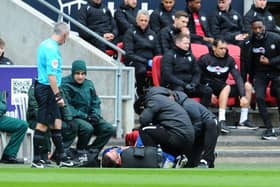 Madine required medical treatment after landing awkwardly on his knee