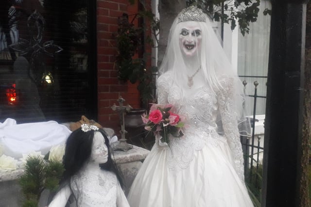 This touching wedding scene look just a little...creepy!