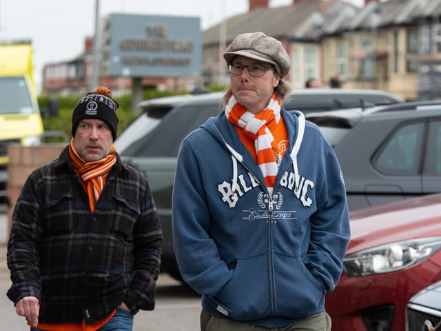 Blackpool fans arrive at Bloomfield Road ahead of the Championship fixture against Burnley. Photo: Kelvin Stuttard