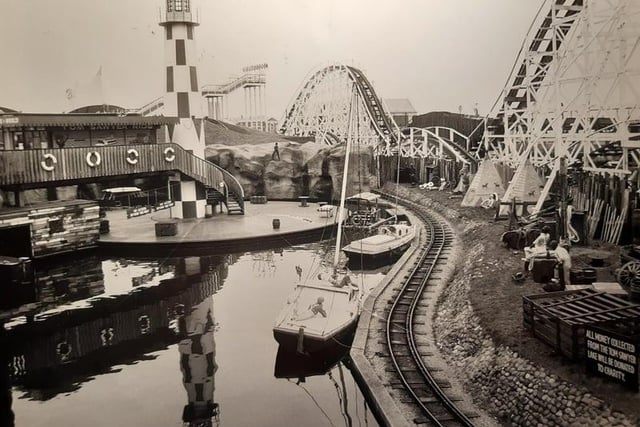 The Tom Sawyer Lake. The sign to the right said that coins, presumably thrown into the lake, would be donated to charity