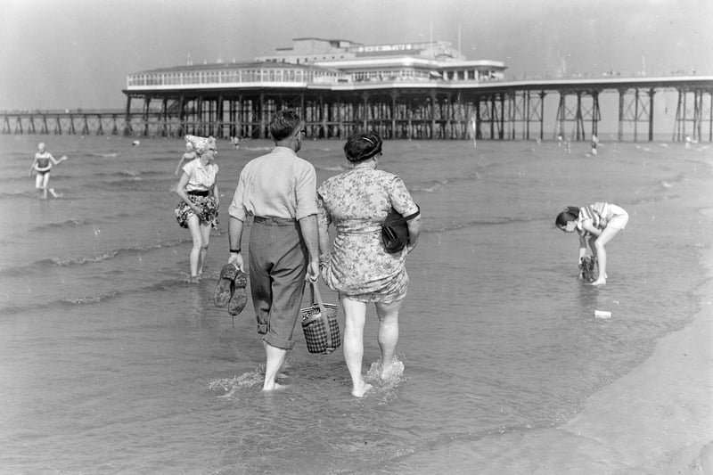 Couple walking along Blackpool Central Beach on September 2 1958