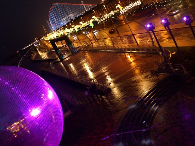 Mirror ball lit up at night, 2006