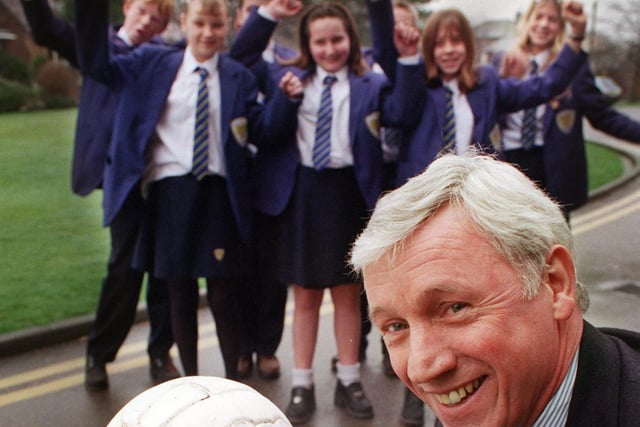 Blackpool FC's all time hero Tony Green celebrates with pupils at Hodgson High School in 1999