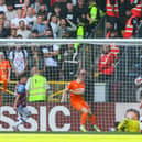 Shayne Lavery steers home Blackpool's second of the game