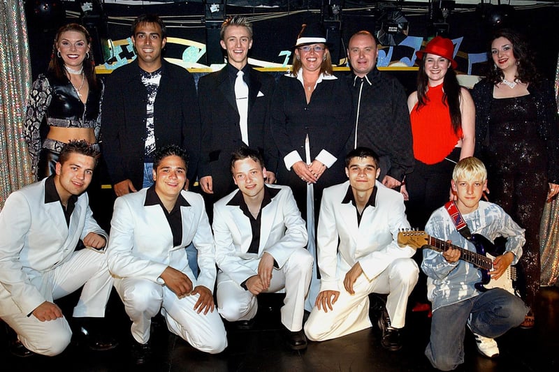 Talent show finalists at The Talk of The Coast at the Viking Hotel in 2003. Back, from left, Madeleine Roberts, Guiseppe, Chris Wood, Kim Haywood, David Lee Michael, Katheryn Pemberton and Carrie Steele.  Front, from left, " Breakthrough " and Luke Machin
