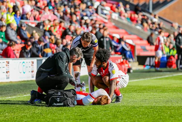 Ged Garner receives treatment on the pitch before being carried off Picture: SAM FIEDLING / PRiME MEDIA IMAGES