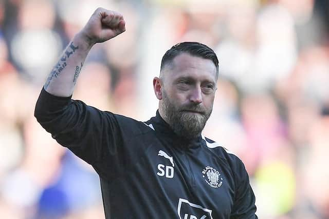 Stephen Dobbie celebrates the three points at full time