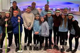 u11 Wildcats Trying thier hand at Curling