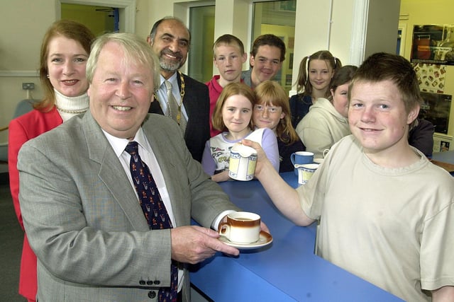 Phillip McCall, 14,  served a coffee to County Councillor Alan Whittaker (Cabinet member for Education and Young People at Lancashire County Council), at the opening of Fleetwood Young People's Centre. Also pictured are Joan Humble (MP for Blackpool North and Fleetwood) and County Councillor Vali Patel (Deputy chairman of Lancashire County Council), with young people at the centre