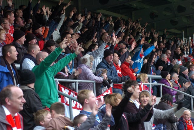 Morecambe fans celebrate Morecambe's goal against Accrington Stanley in 2003