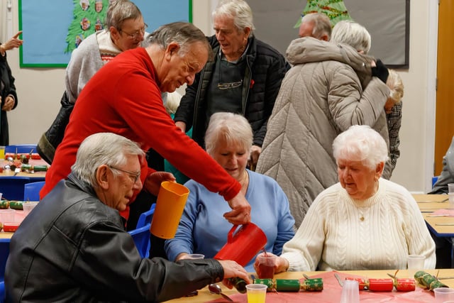 A helping hand during the Christmas lunch at Manor Beach