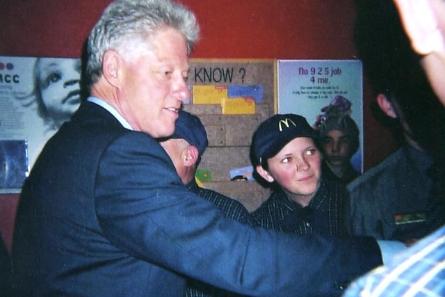 Clinton meets staff at Blackpool McDonalds in 2002