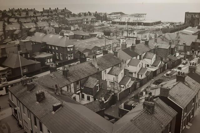 This was taken from the top of Pharos Lighthouse on March 18th 1975. It's looking north west towards the sea. Upper Lune Street to the bottom right with a clutch of houses on Pharos Street to the left. Fleetwood Hospital clearly visible with North Albert Street properties and their back alley, centre.  North Church Street is beyond, facing the court buildings and a swathe of land which would eventually be Fleetwood Police Station. Fleetwood Pier can be seen too