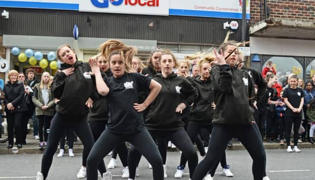 Dancers on Church Street from Conisbrough.
