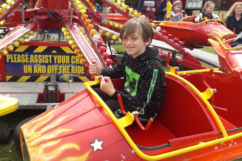 Joseph Johnson in a funfair car