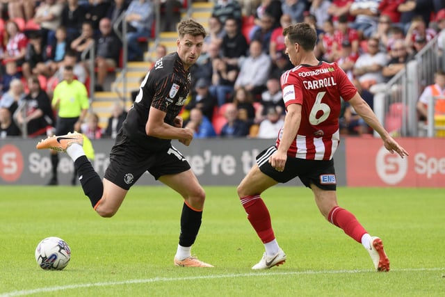 Ex-Tottenham, Swansea and QPR midfielder Tom Carroll joined Exeter City last summer after taking some time out of the game.